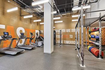 Fitness center with cardio machines (stair stepper), circuit/strength training, stationary bikes